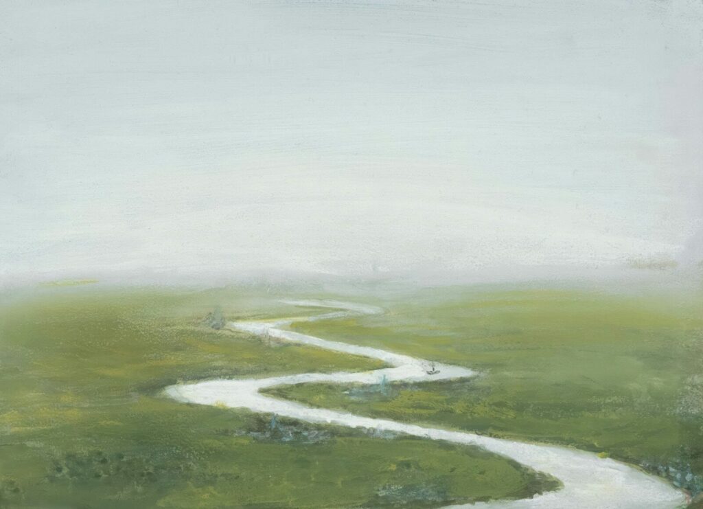 A winding river flows through a misty green landscape.